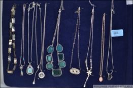 A group of 10 costume/dress necklaces of