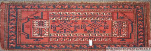 An Ersari Torba with red ground and geom