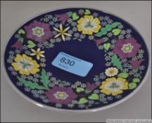 An early 20th century enamel dish with s