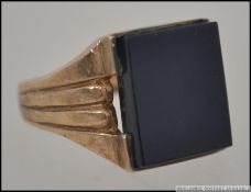 A 1970's gentlemans 9ct gold signet ring