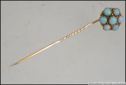 An 18ct gold ( tested ) and 7 stone opal