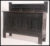 An 18th / 19th century carved oak Jacobe