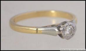 An 18ct gold ladies buckle set diamond r