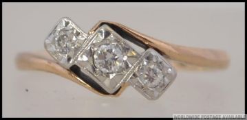 A 9ct gold and platinum diamond 3 stone