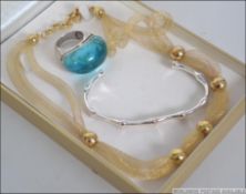 A collection of cased silver jewellery i