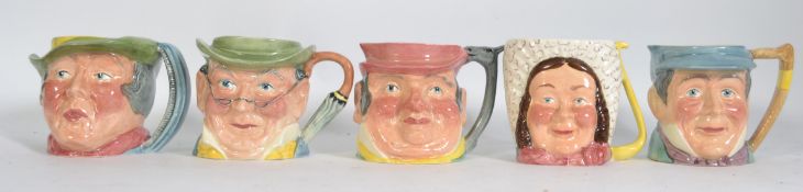 A collection of 5 vintage character toby