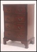 A Georgian style mahogany small bachelor