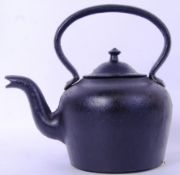 A reproduction cast iron barge style lid