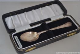 A cased silver hallmarked teaspoon being