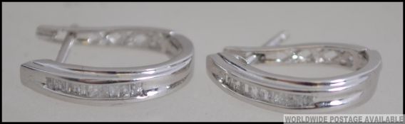 A pair of beautiful 14ct white gold and