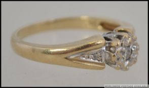 A vintage 9ct gold and diamond illustion