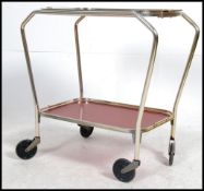 A Art Deco style two-tier tea trolley.