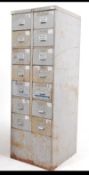A mid century Industrial 14 drawer metal filing cabinet in original paintwork.