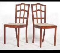 A rare pair of original Welsh Brynmawr vintage Art Deco mahogany lattice back dining chairs having
