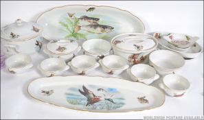 A good mid century hunting related part dinner service / serving set. Each detailed with game.