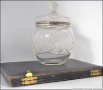 A silver and cut glass hallmarked collar biscuit barrel.