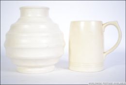 Keith Murray Vase- A bomb shaped vase in the Moonstone colourway.