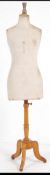 A vintage early 20th century dressmakers dummy by Siegel,