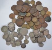 A collection of vintage coins dating from the 12th century to include several six pence coins,