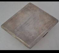 A silver hallmarked cigarette case marked for Walker & Hall, Sheffield 1939.