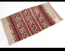 A Vintage Persian Camel Bag of Tribal and nomadic form being made from 100 % wool .