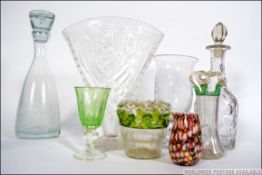 A collection of vintage glass wares to include a Wedgwood decanter with a control bubble stopper,