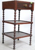 A 19th century stained pine washstand raised on barleytwist supports having 3 tiers,