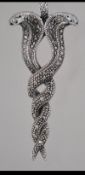 A silver double headed cobra snake pendant necklace. Weight approx 18g.