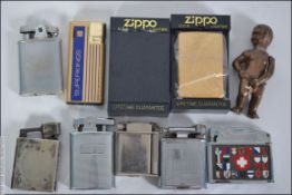 A collection of lighters to include Hart D1,Ronson, Penguin, Polo,