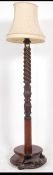 A good early 20th Century Wooden Standard Lamp with barley twist carved column,