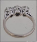 An 18ct white gold and 3 stone diamond ring, approx 1ct of diamonds across 3 stones.