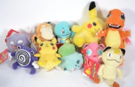 A group of original 1990s first generation Pokemon plush toys to include Pikachu,