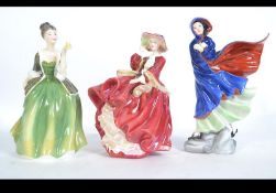 A collection of Royal Doulton ceramic figurines to include Fleur HN2368,