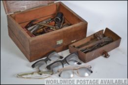 A collection of vintage tools set within engineers wooden box,