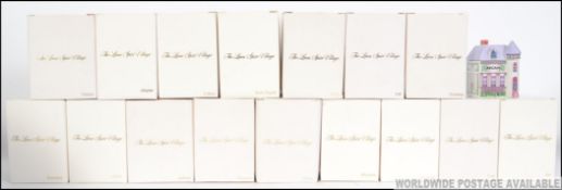 A collection of 19 collectable Spice Houses / Spice Village - Spice jars.