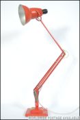 A 1940's Herbert Terry two step orange / red anglepoise Industrial desk lamp having square