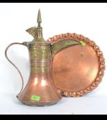 An Islamic Persian - Turkish Ottoman copper and brass ware lidded tea / coffee jug along with a