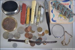 A dealers lot to include a Cunard paperweight, Vincents dress watch, coins,