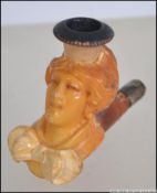 A Meerschaum pipe with mouthpiece (detached) bowl carved as ladies head in original case.