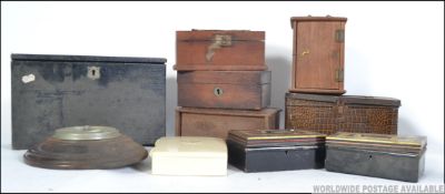 A collection of boxes and tins to include petty cash tins, wooden carriage clock case,