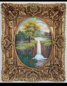 A 20th century oil on oval convex board panel painting of a waterfall scene set with a decorative