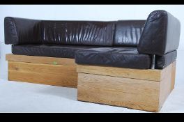 A pair of 20th century retro oak and leather modular corner sofa's .
