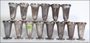 An unusual set of Belgian silver plated ice cream beakers - pots.