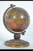 A 1930's Art Deco Rensie Globe German Alarm Clock in brass case with opening movement.