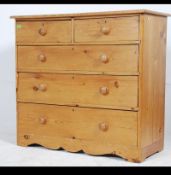 A 19th century scrubbed pine two over three chest of drawers having two short drawers over three