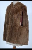 A collection of vintage early to mid 20th century fur coats. Various styles and lengths.