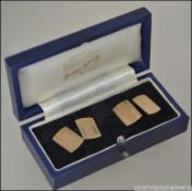 A pair of vintage gentlemans 9ct gold hallmarked cuff links presented within the original case.