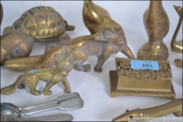 A collection of vintage 20th century brass wares to include horse brasses,