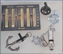 A vintage brass British made ' MP Handy Guide for Knitting and Crochet ' together with an ARP