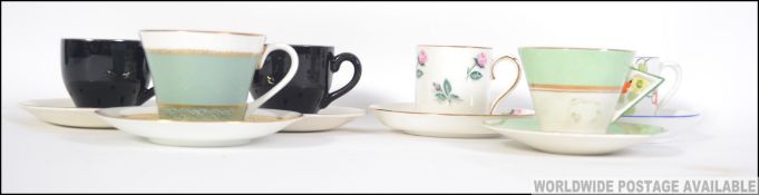 A group of ceramic part tea service coffee cans / cups and saucers to include art deco examples,